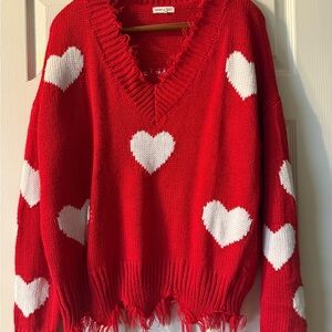 Stylish Red V-Neck Sweater with White Heart Pattern